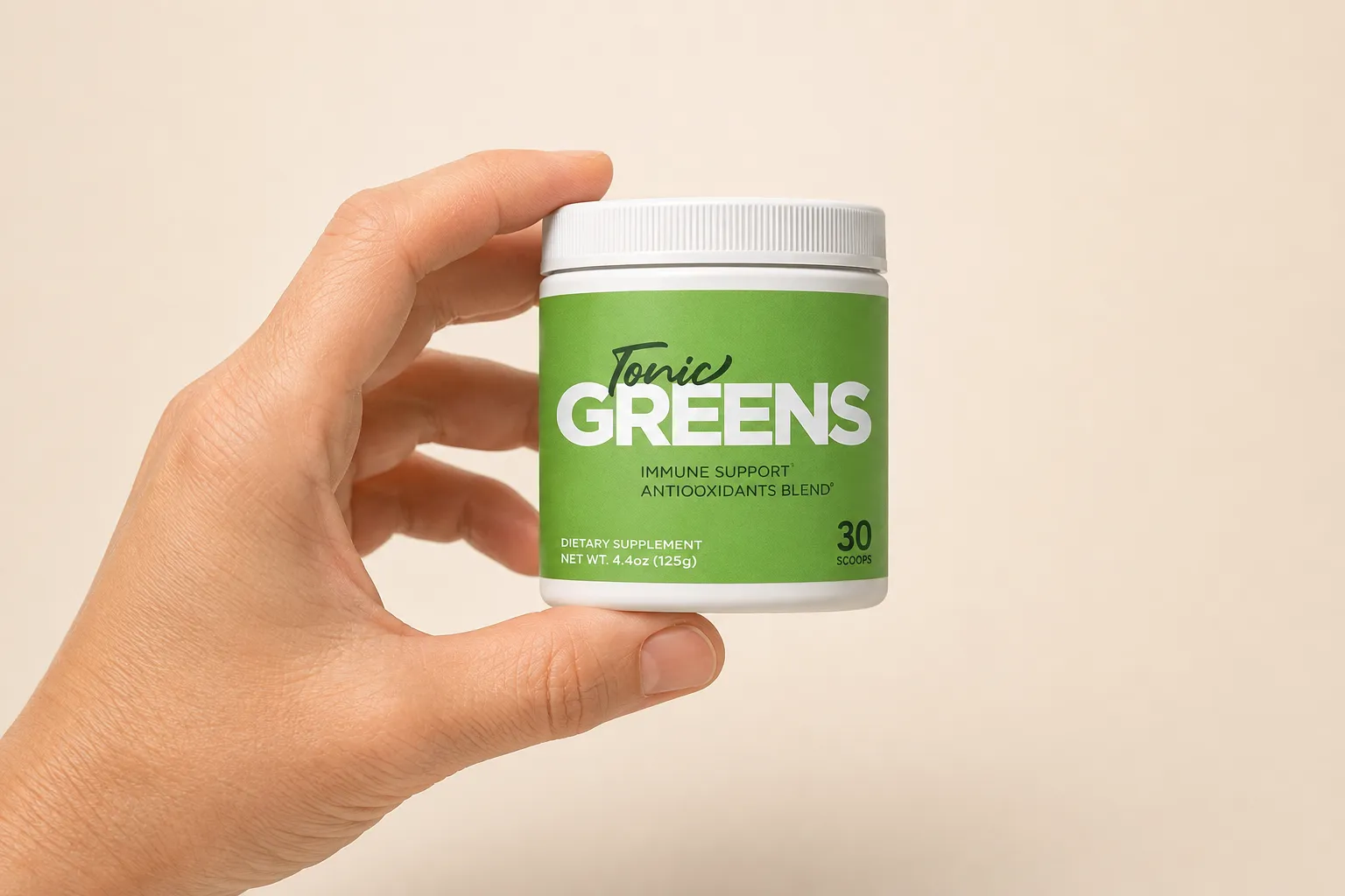 TonicGreens — the package held in a hand