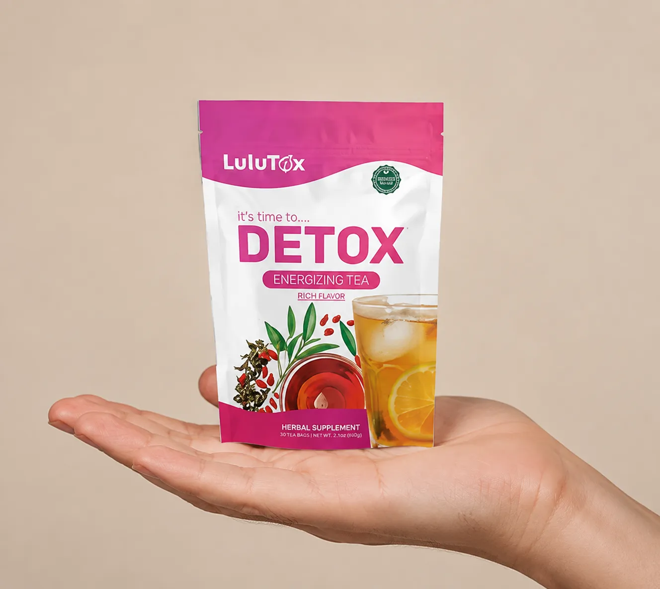 Lulutox Detox Tea — the package held in a hand